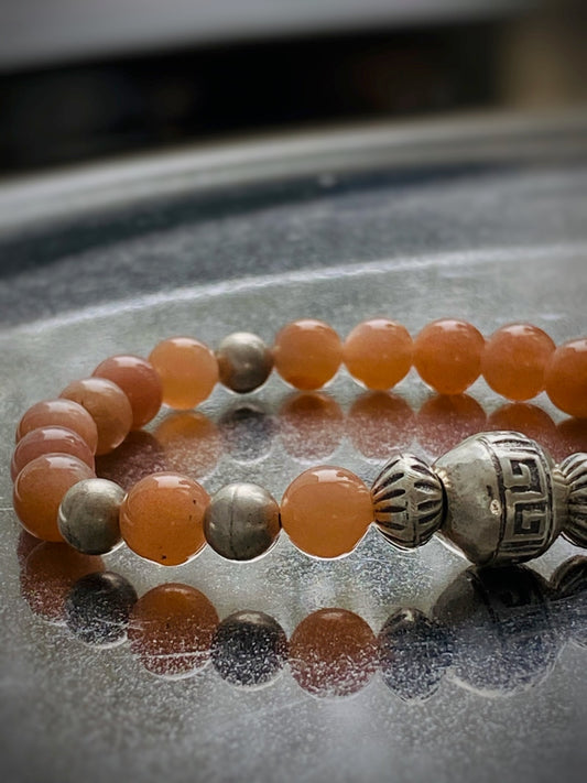 A543 - Orangefarbener Mondstein mit Silber