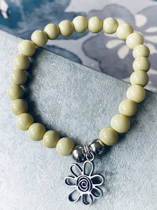 A596 - Gelbe Glasperlen mit Blume