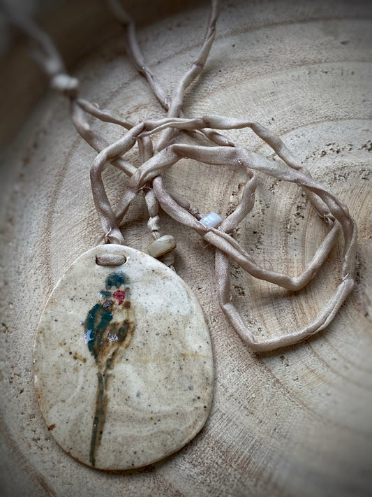 K116 - Tonamulett mit Papagei
