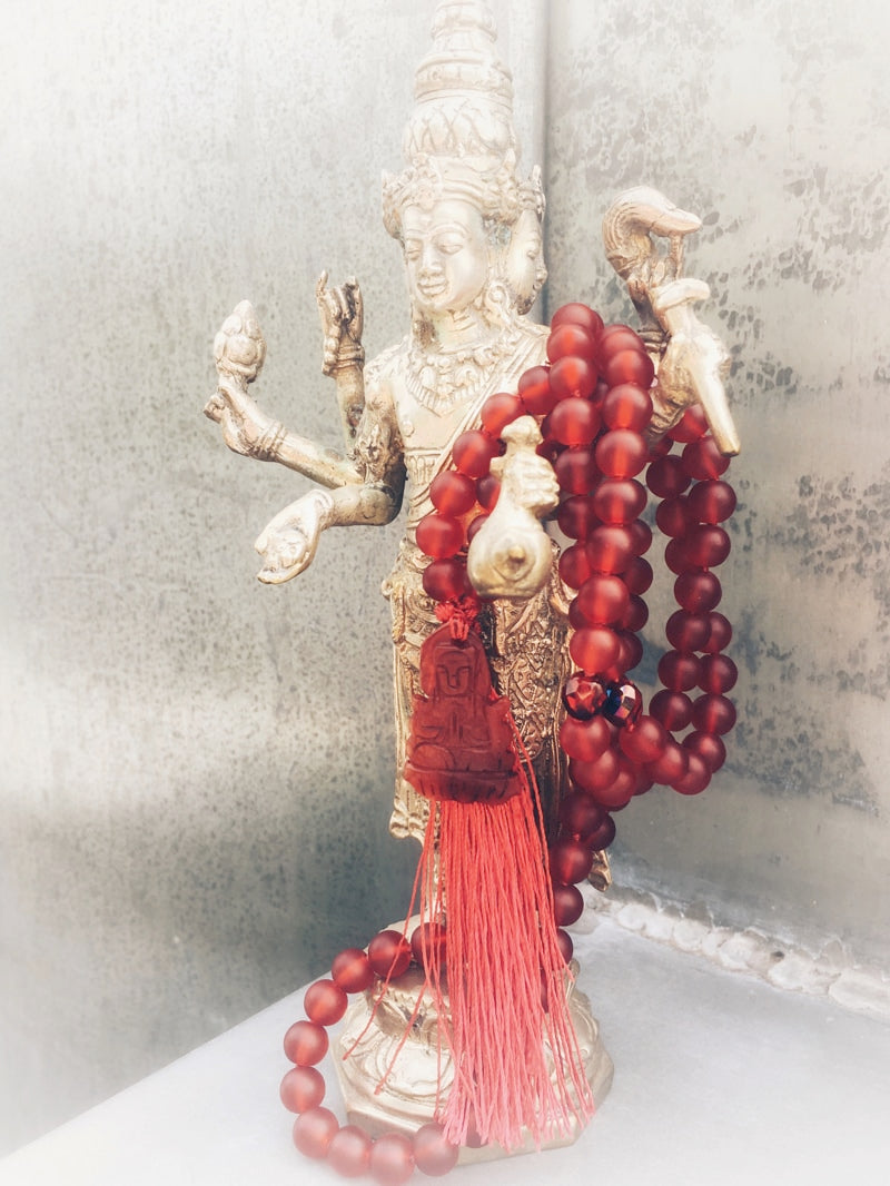 M064 - Red Buddha