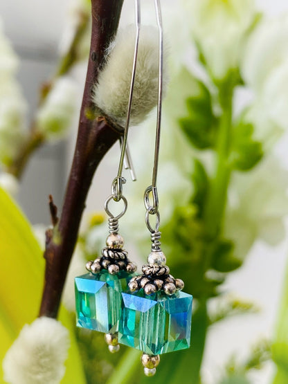 E005 - Silberohrringe mit Swarovski-Perlen