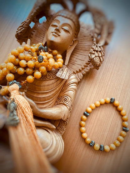 A214 - Honiggelbe Jade mit Messing-Bicone