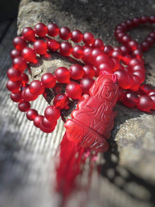 M064 - Red Buddha