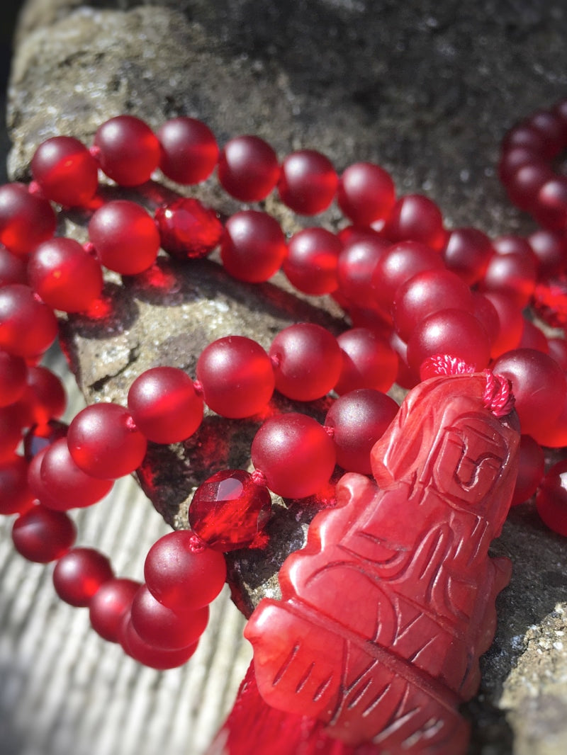 M064 - Red Buddha
